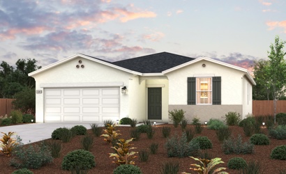 A house with bushes in front of it.