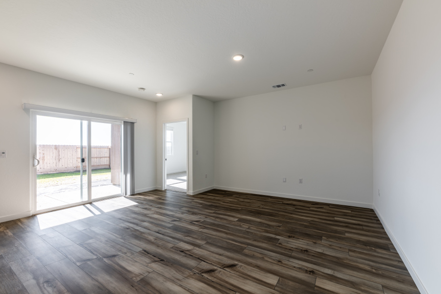 A room with a wood floor and a wood floor.