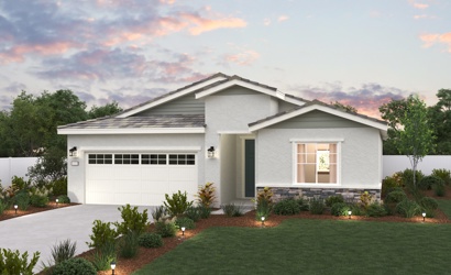 A house with a lawn in front.