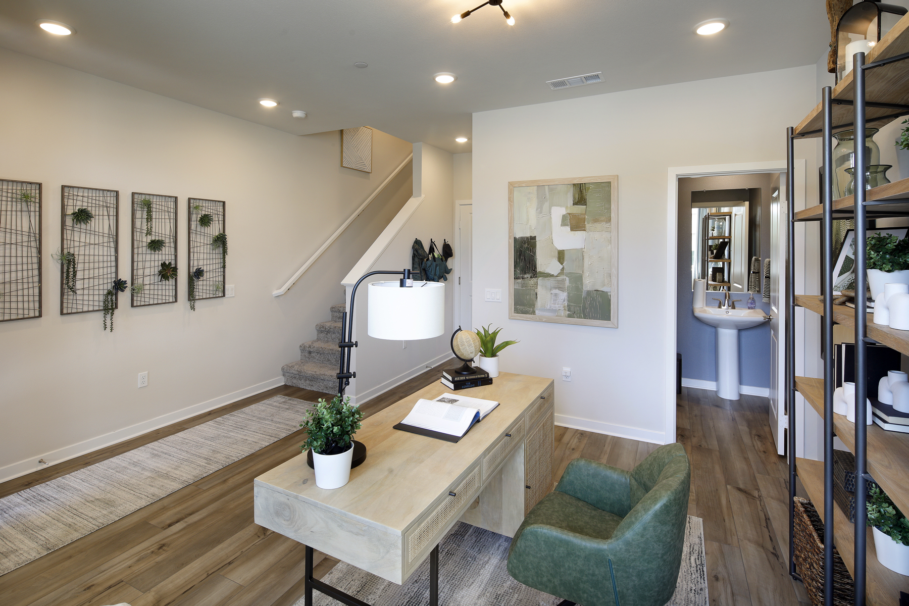 A room with a table and chairs.