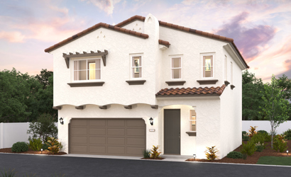 A white house with a garage.