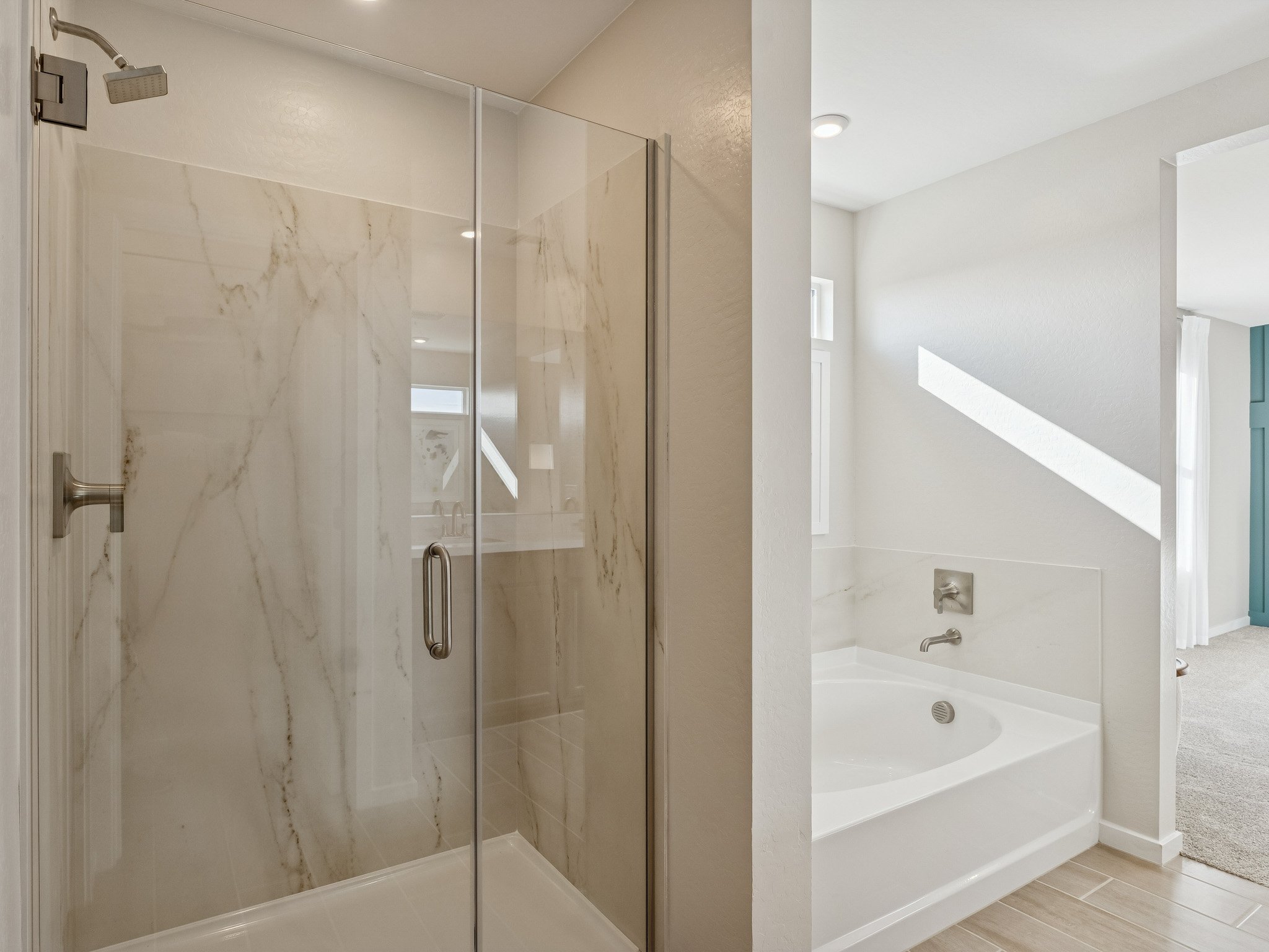 A bathroom with a glass shower.