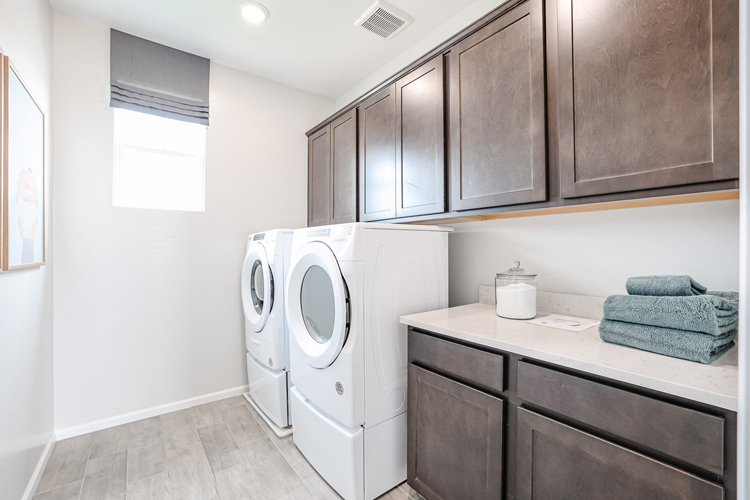 A laundry room with a washer and dryer.