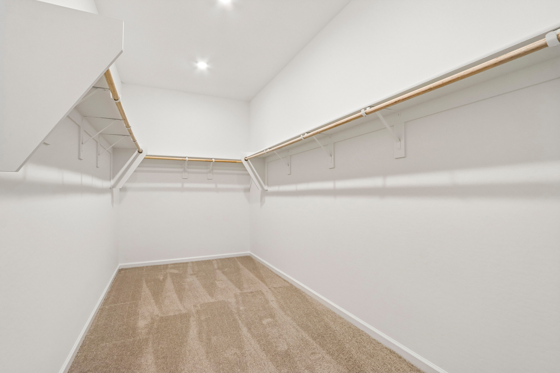 A hallway with white walls.