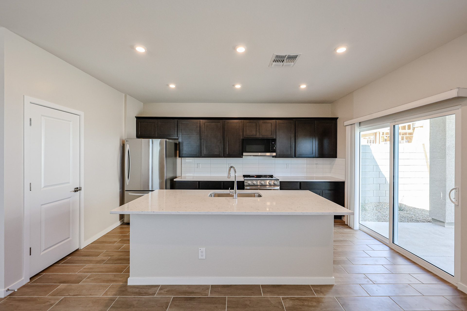 A kitchen with a large island.