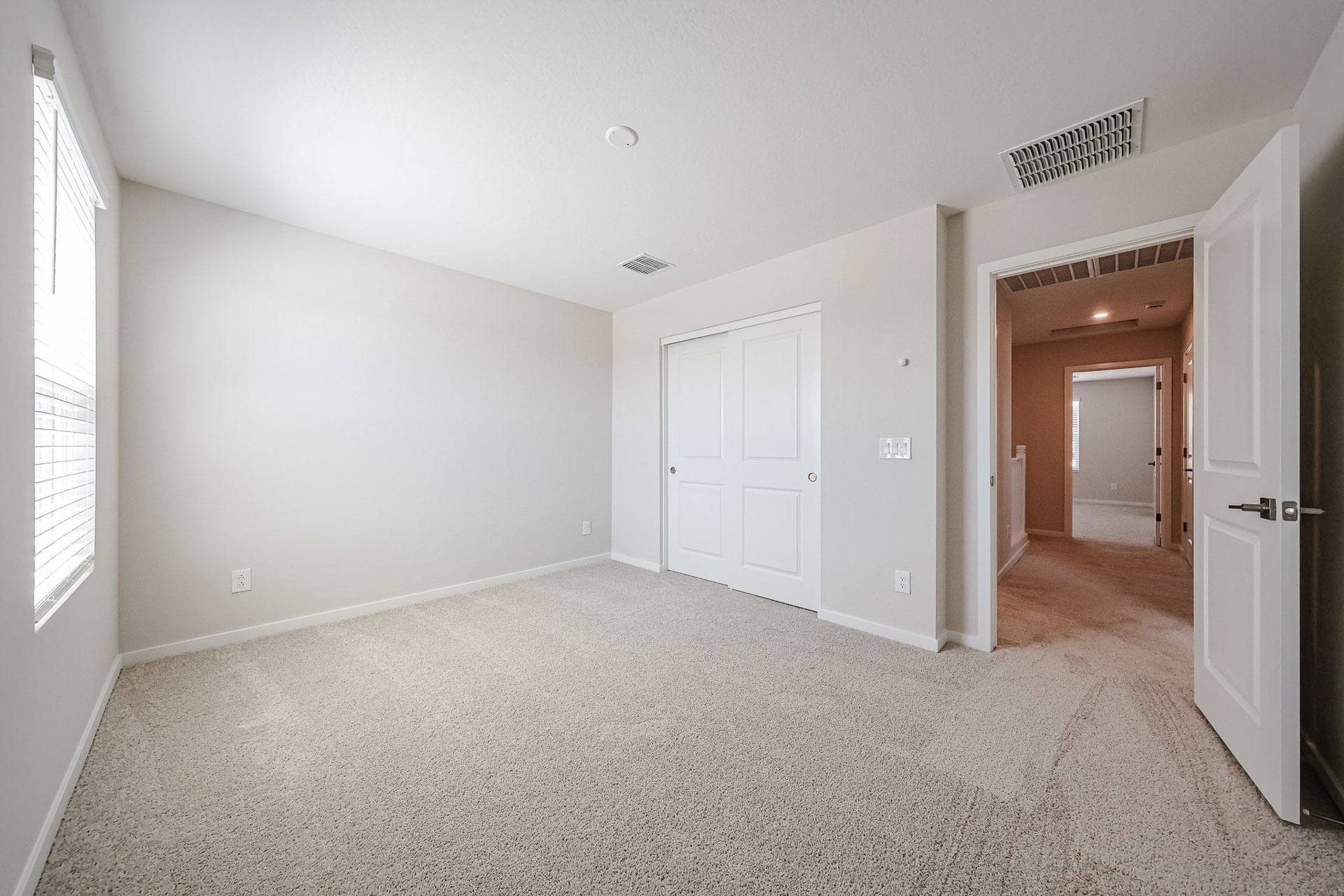 A room with white doors.