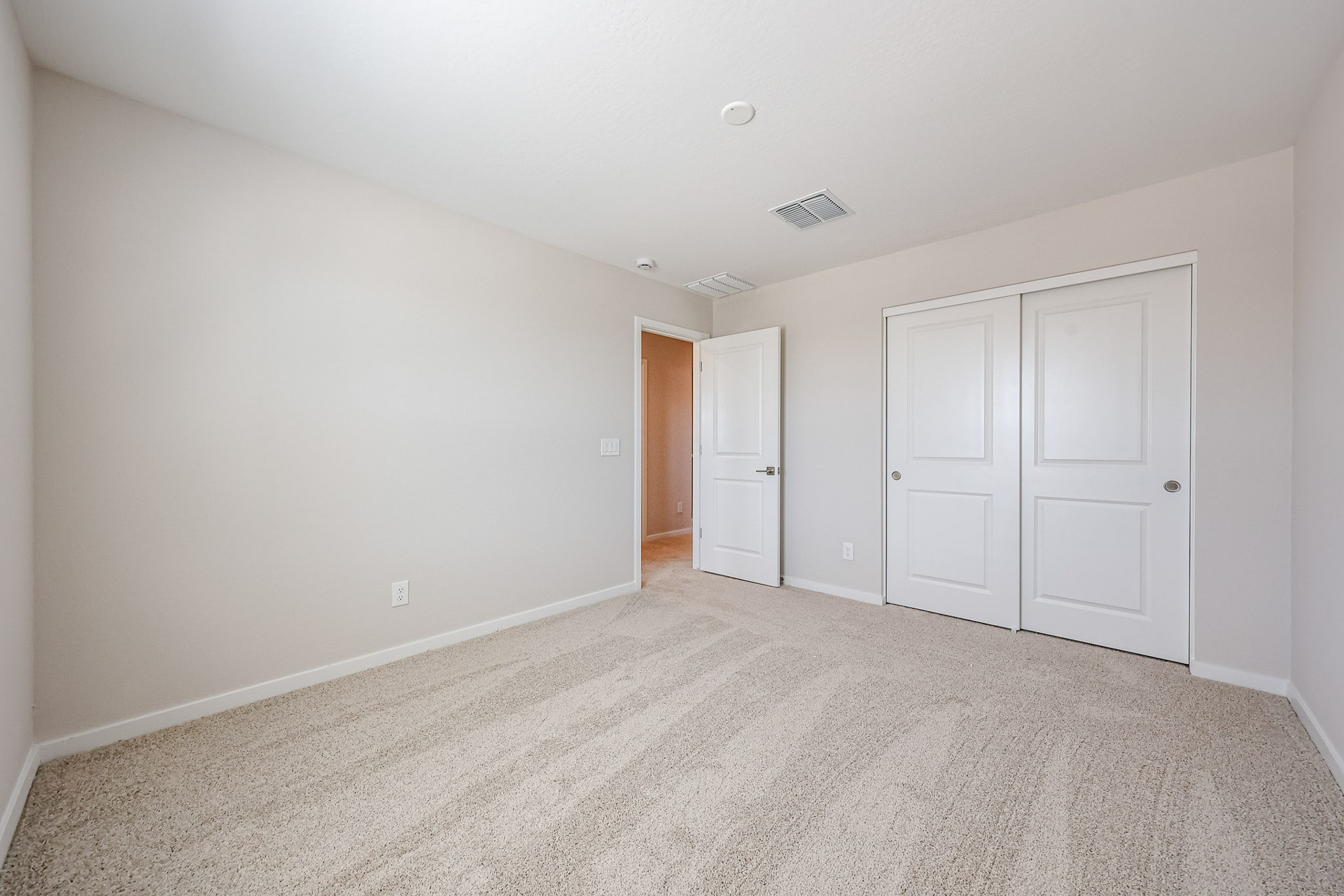 A room with white doors.
