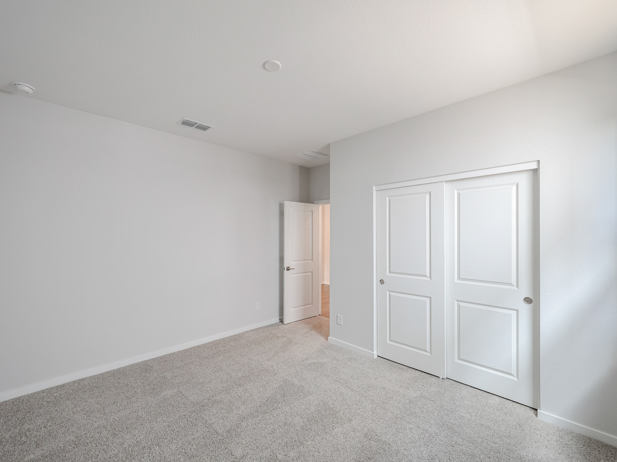 A room with white doors.