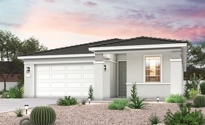 A house with a gravel driveway.