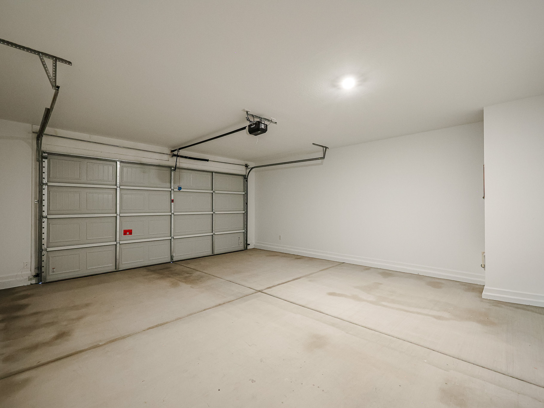 A room with a metal gate.