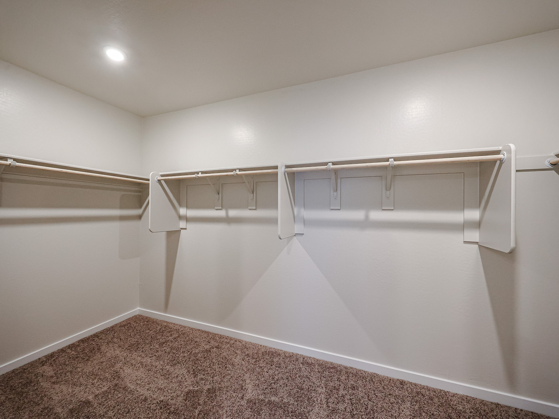 A white bathtub in a bathroom.