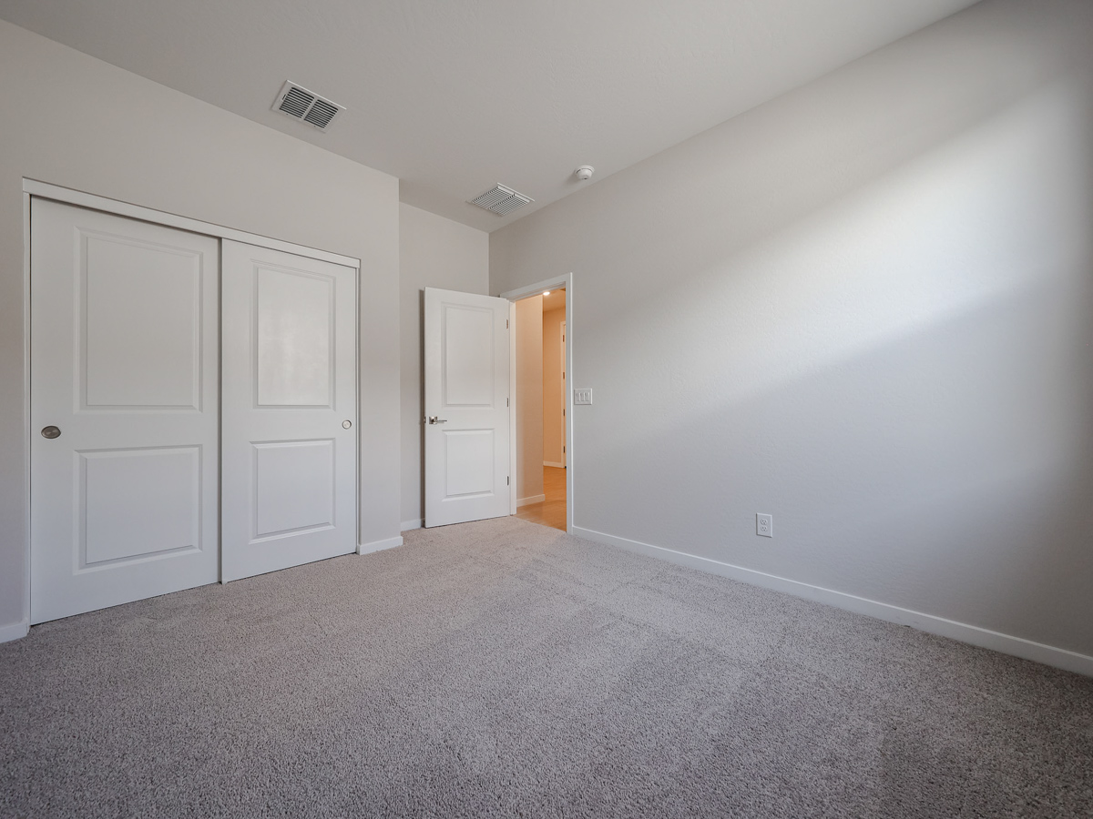 A room with white doors.
