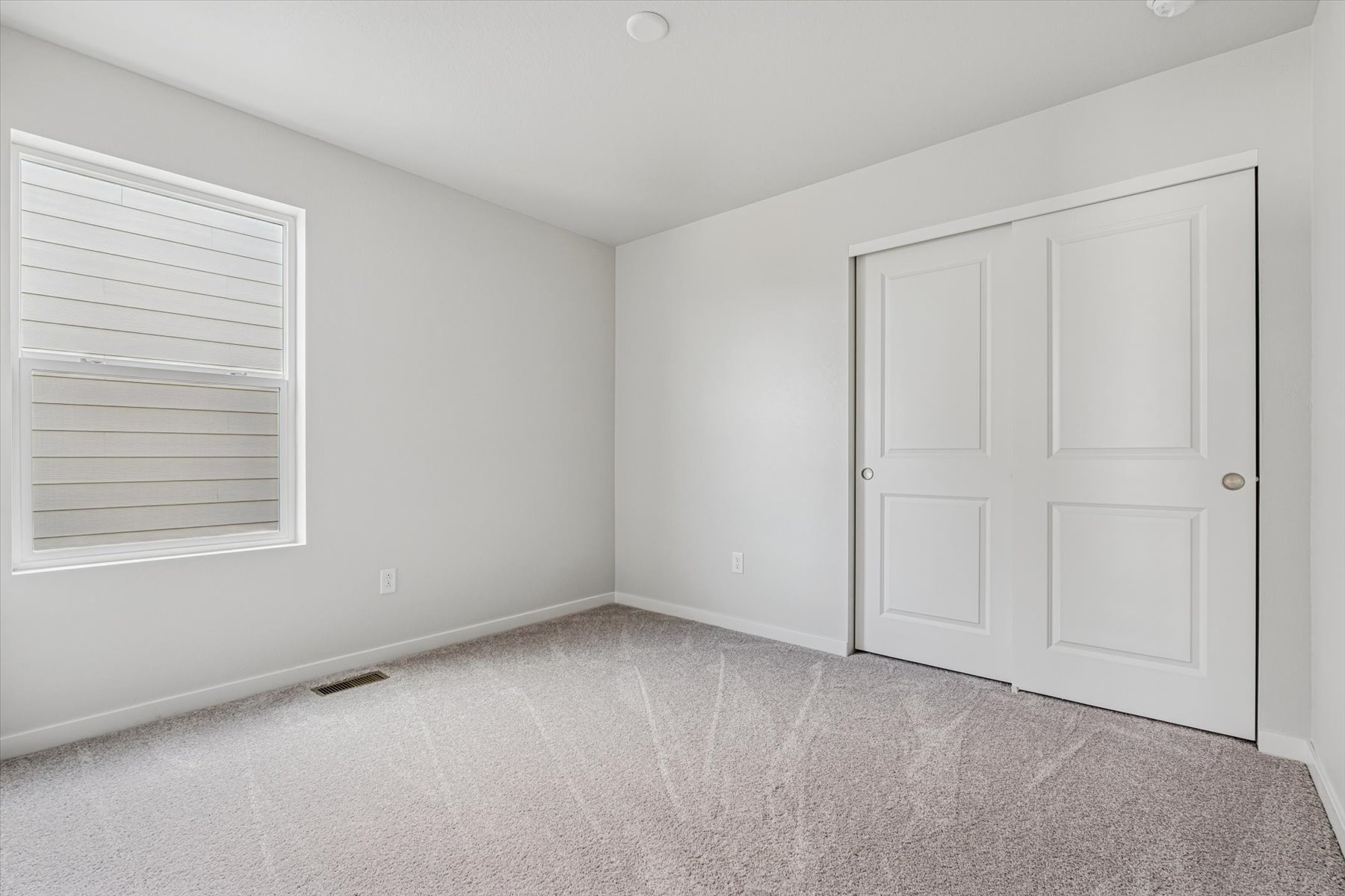 A room with white doors.