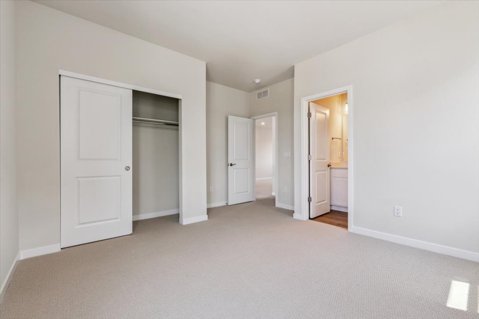 A room with white doors.