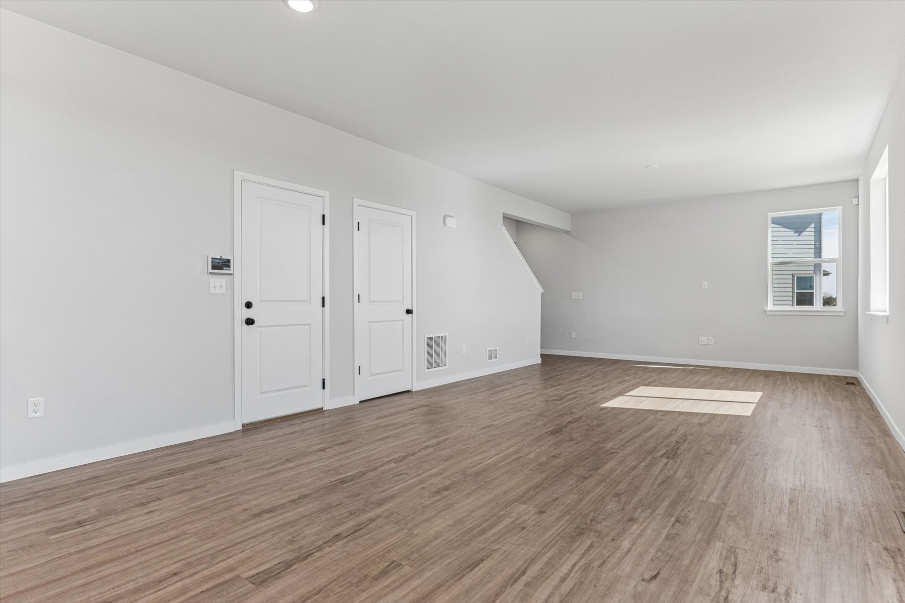 A room with white doors.