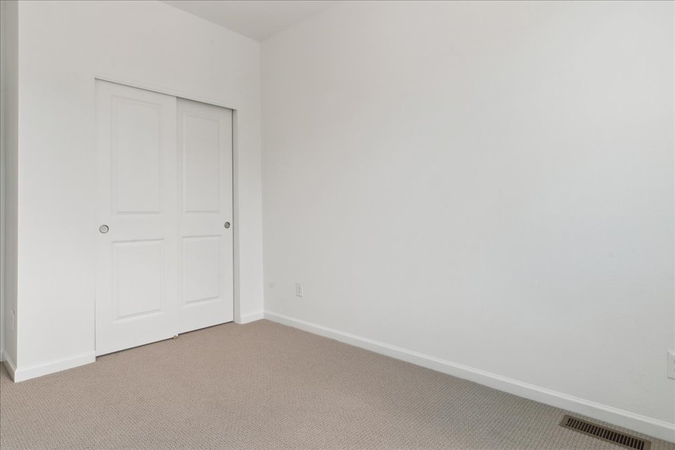 A room with white doors.