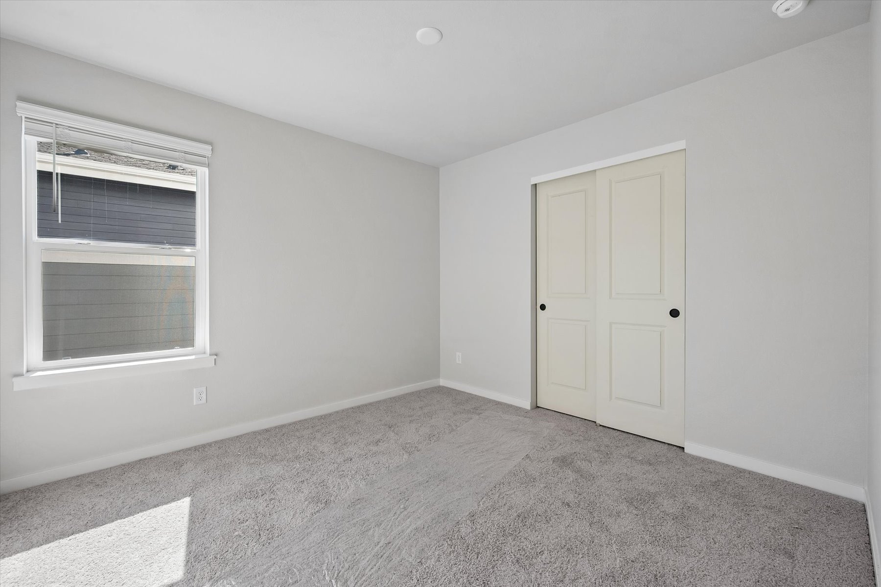 A room with white doors.