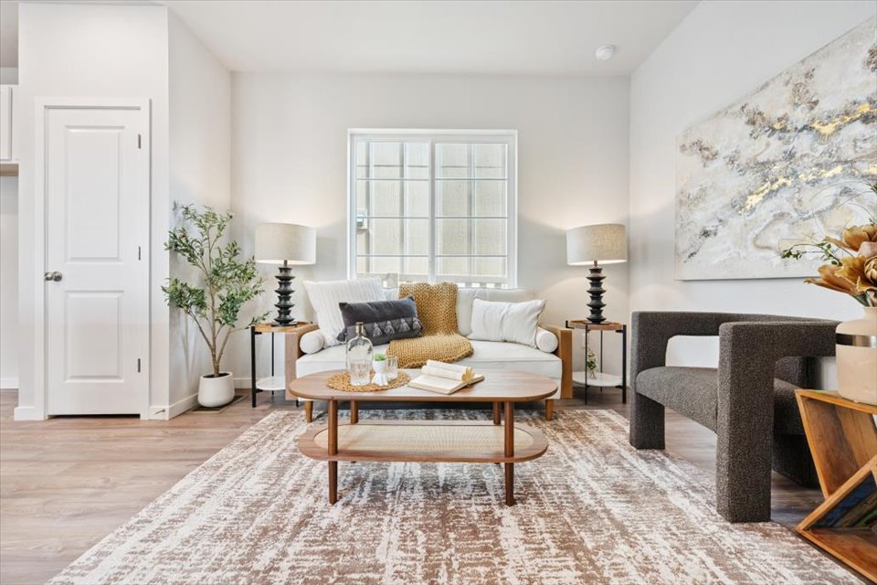 A living room with a couch and a coffee table.