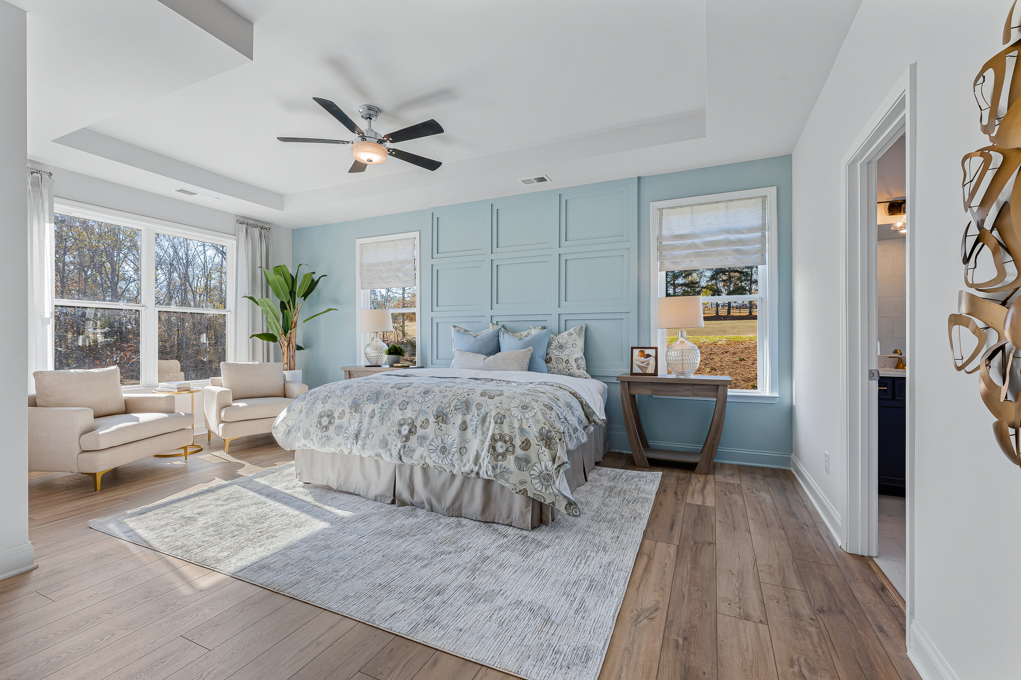 A bedroom with a bed and a couch.