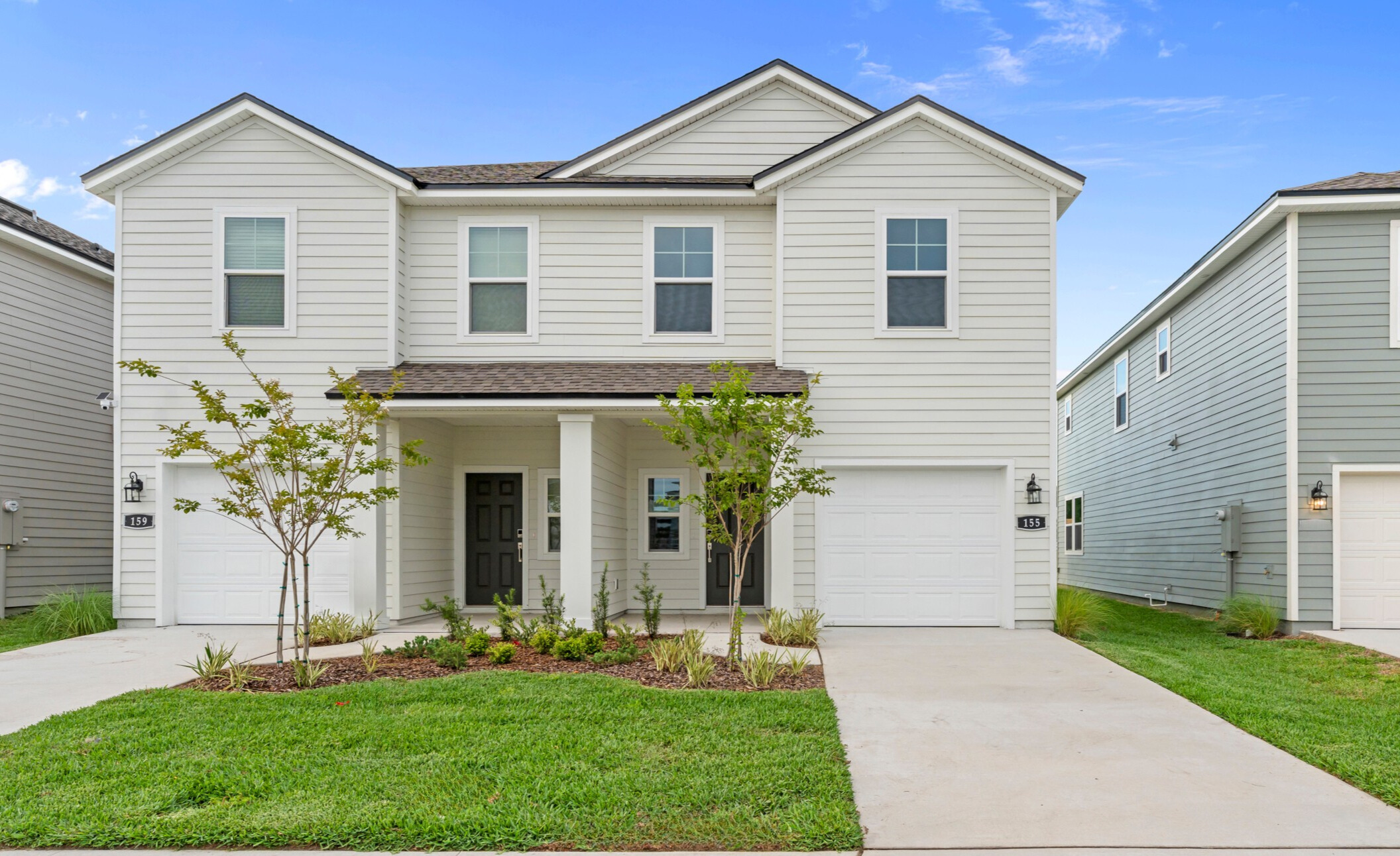 Davor Paired Home Exterior at The Landings at Pecan Park in Jacksonville