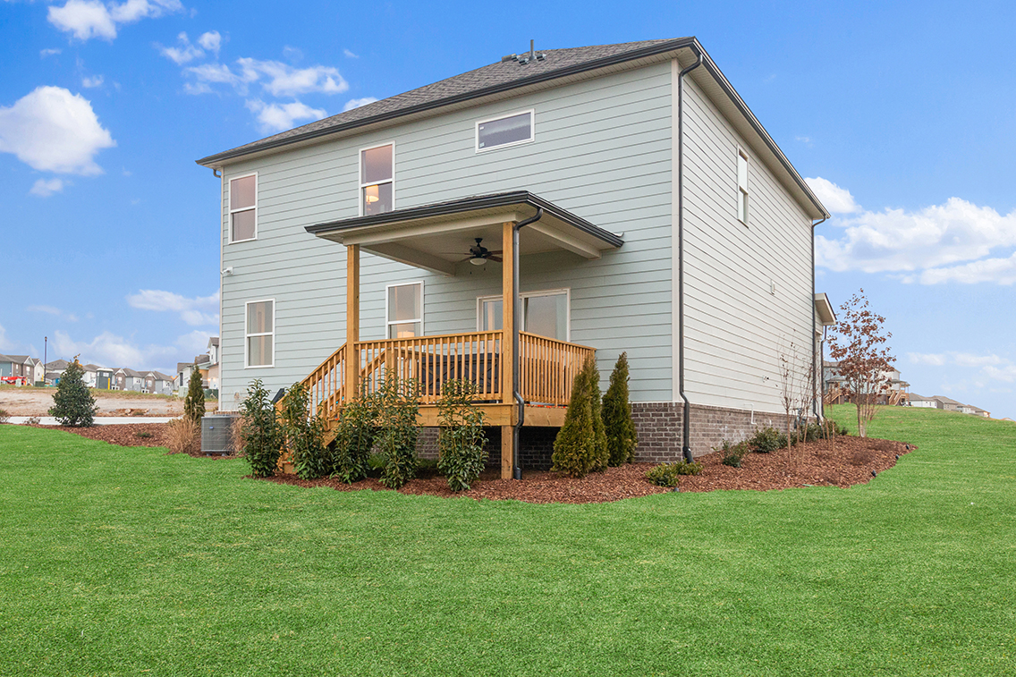 A house with a large front yard.