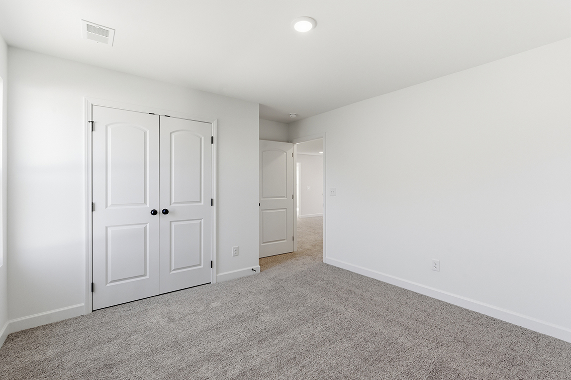 A room with white doors.