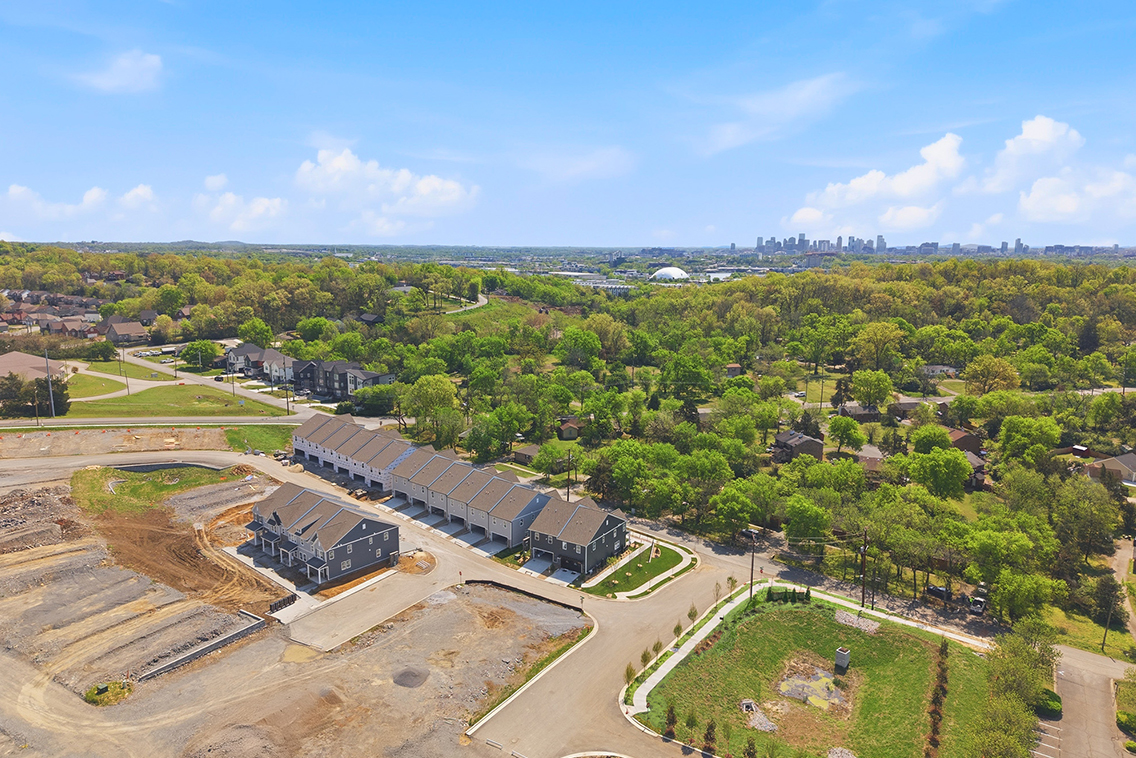 A large area with buildings and trees.