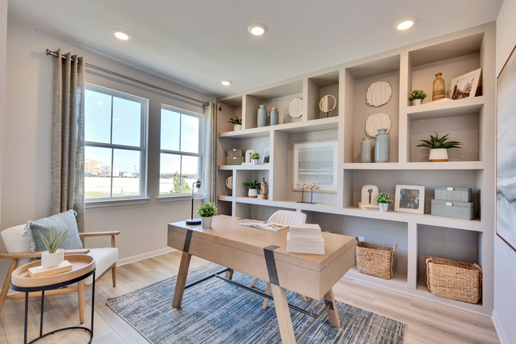 A room with a table and chairs.