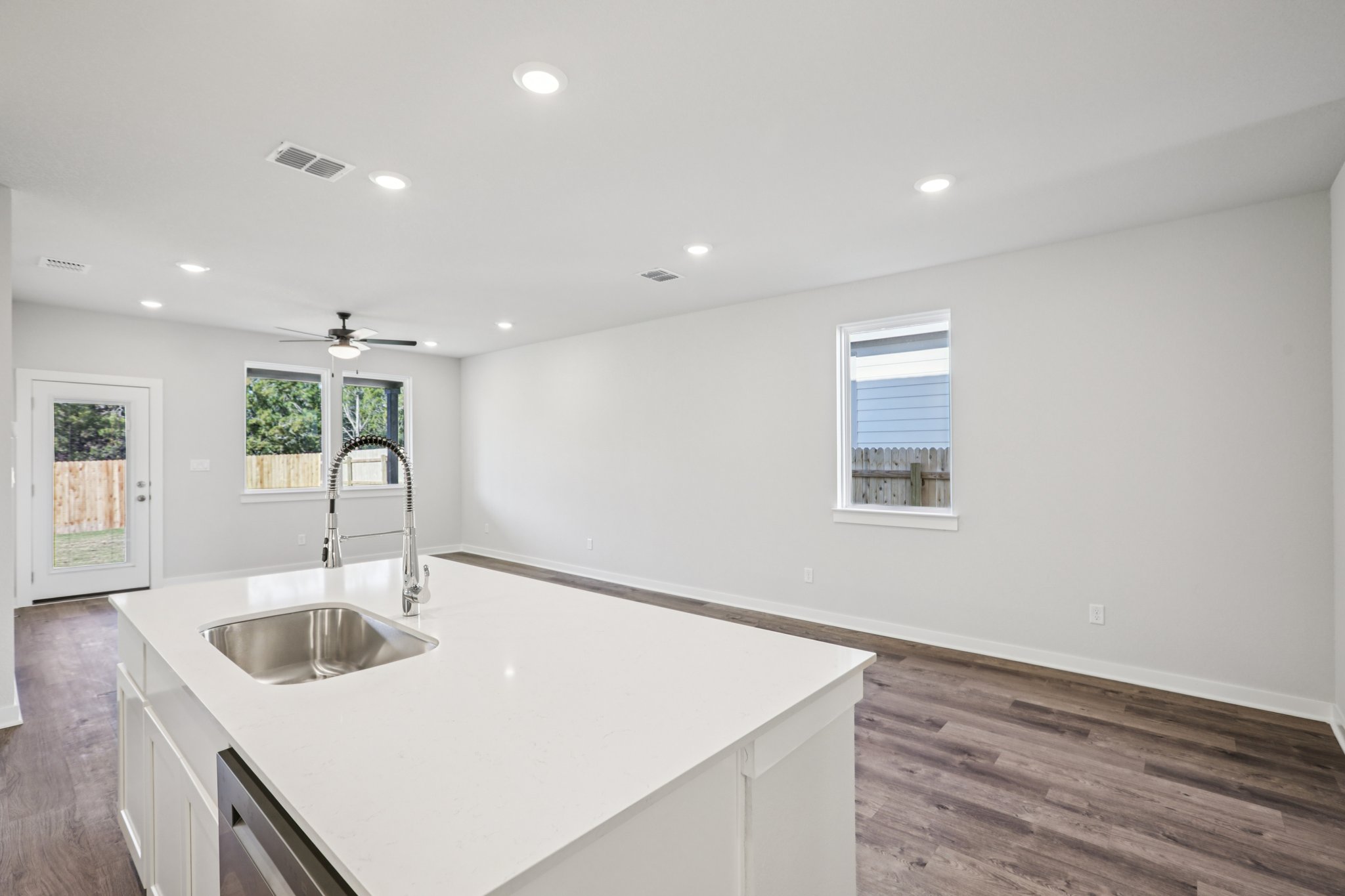 A kitchen with a sink and a countertop.