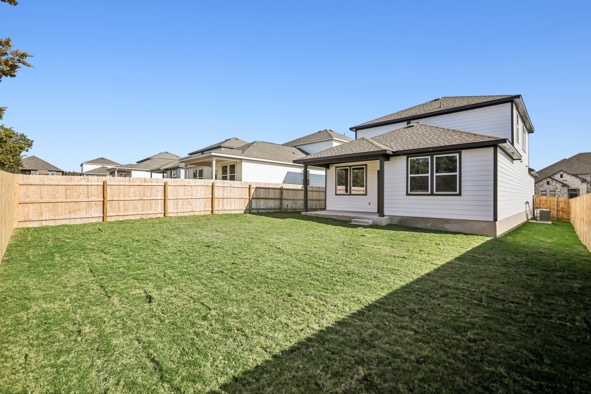 A house with a fence around it.