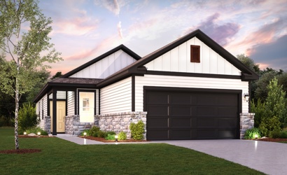 A house with a grass yard.