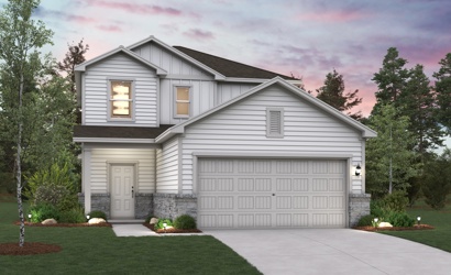 A white house with a garage.