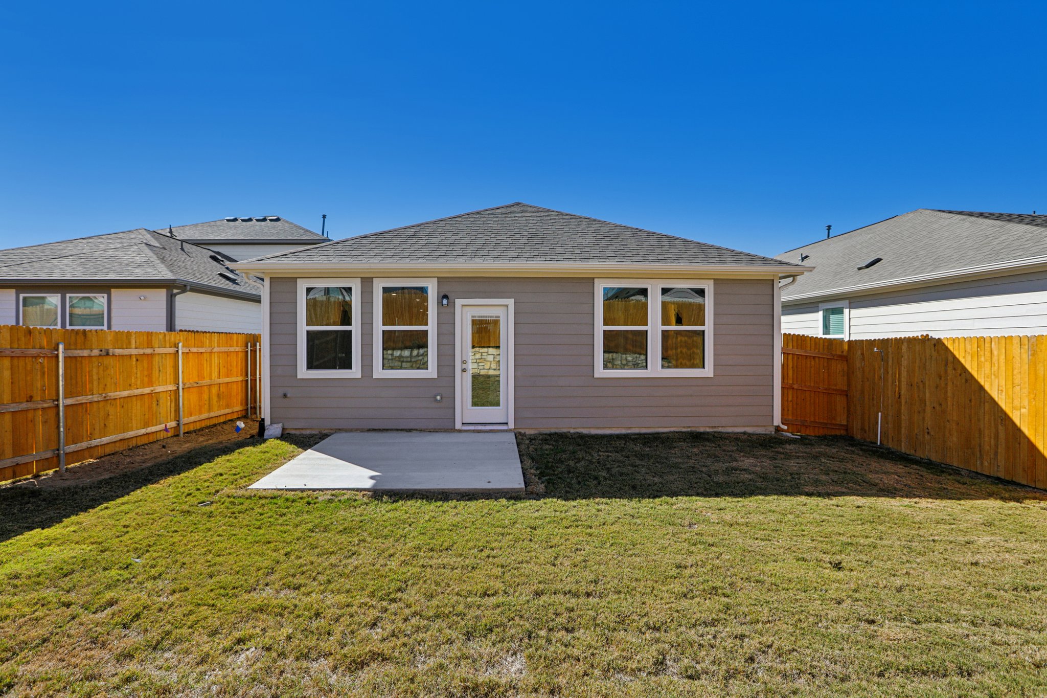 A house with a fence around it.