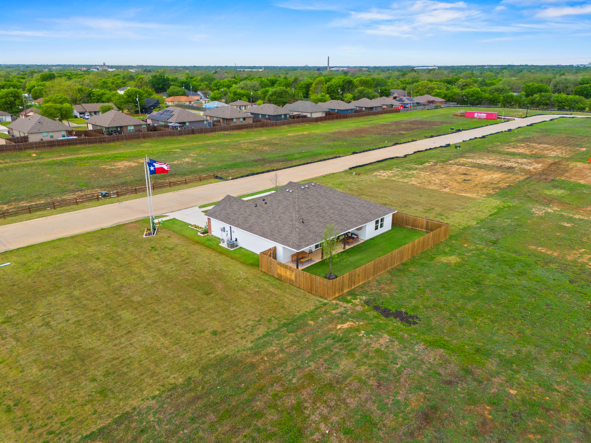 A small building in a field.