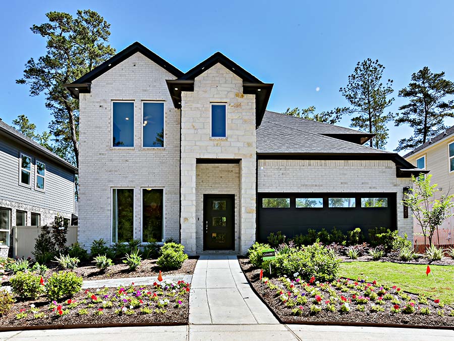 A house with a large front yard.