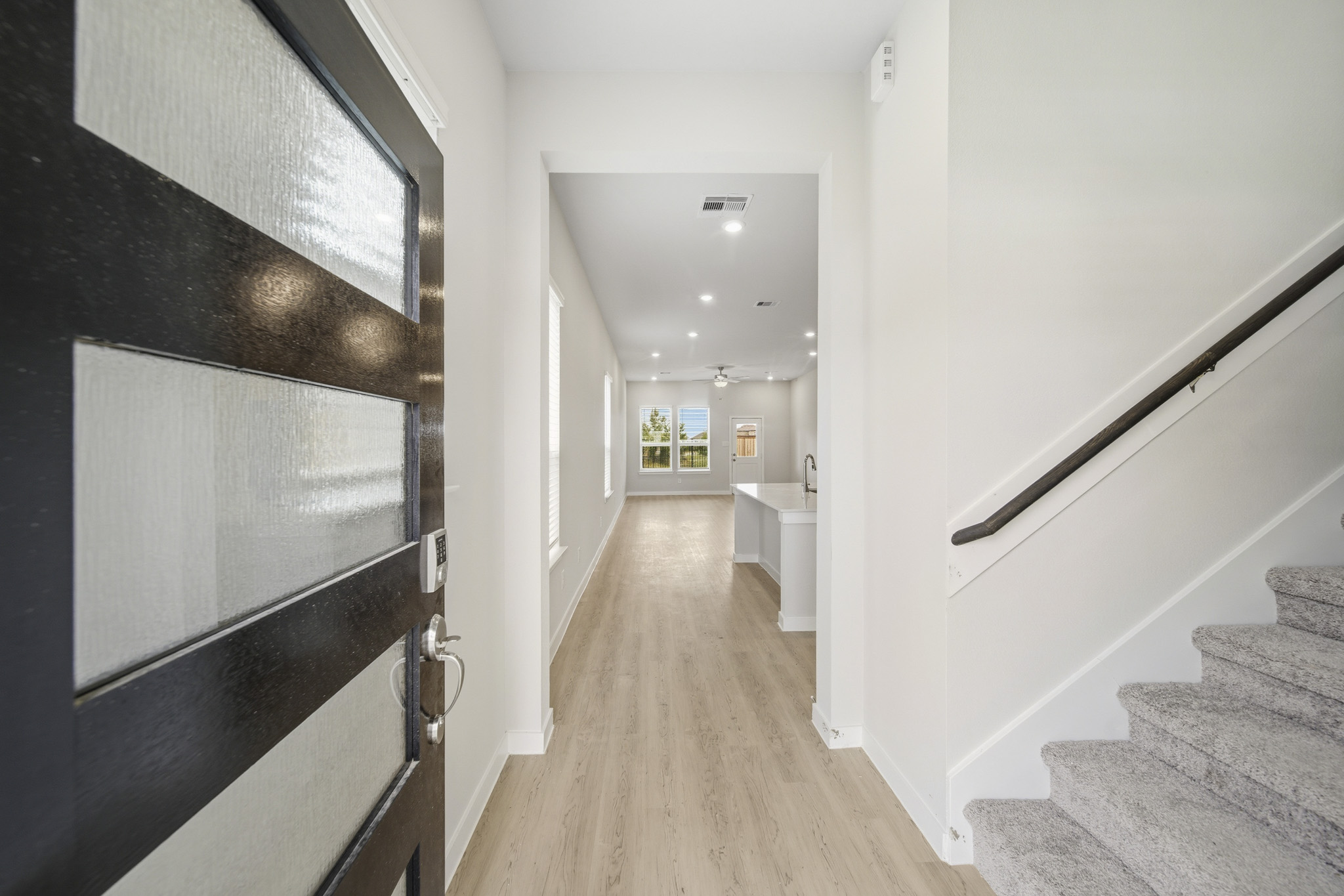 A hallway with black walls.