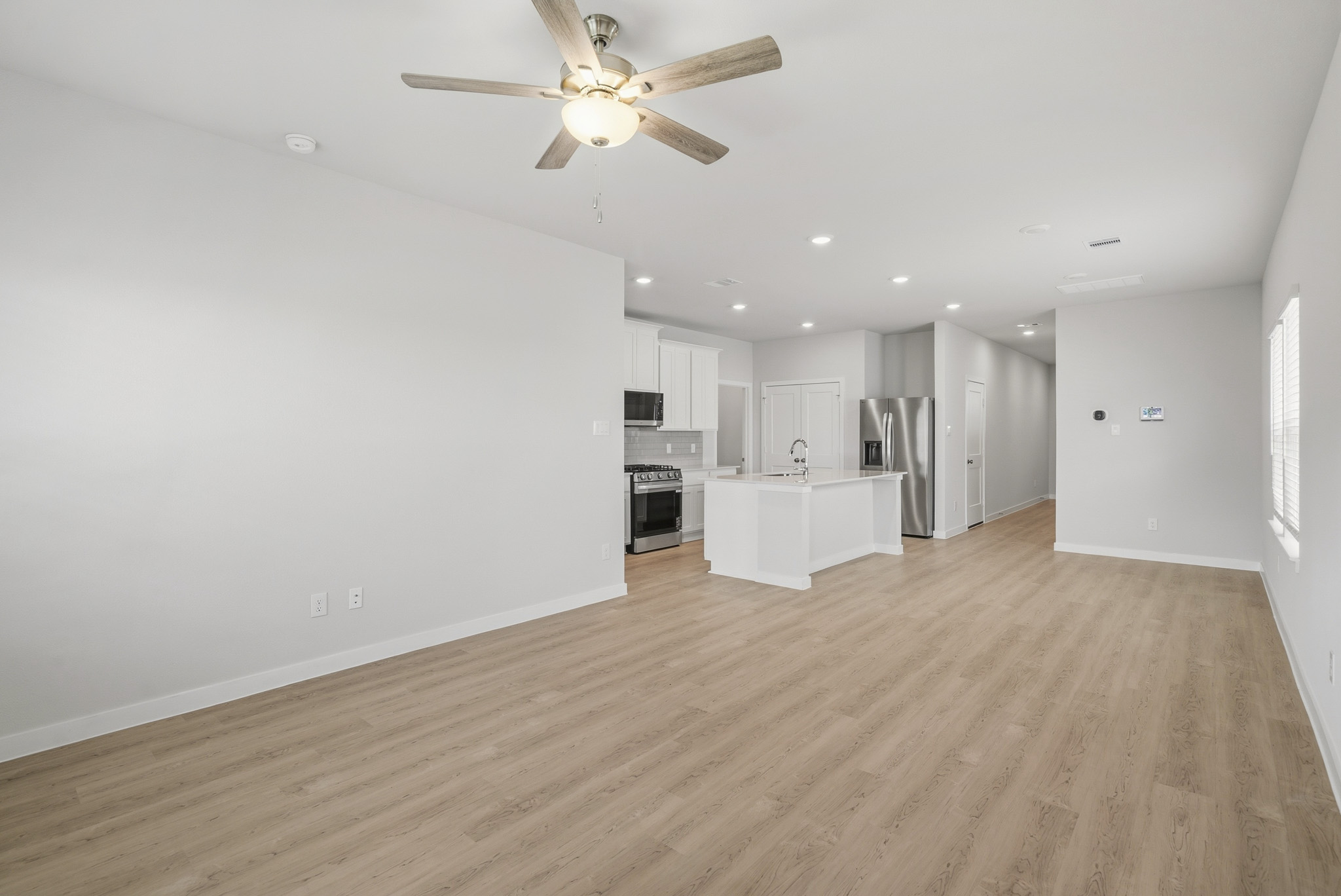 A large empty living room.