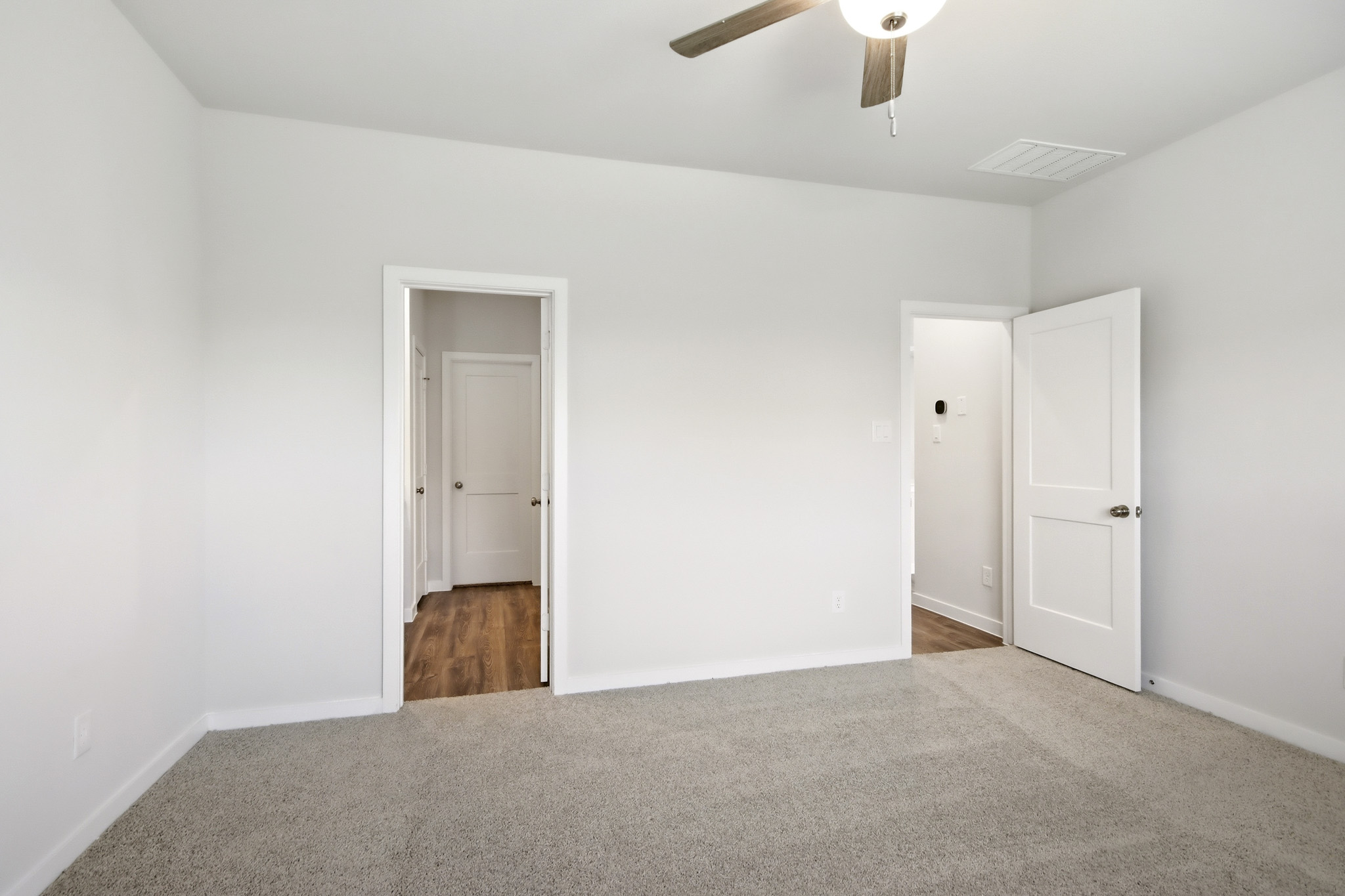 A room with white doors.