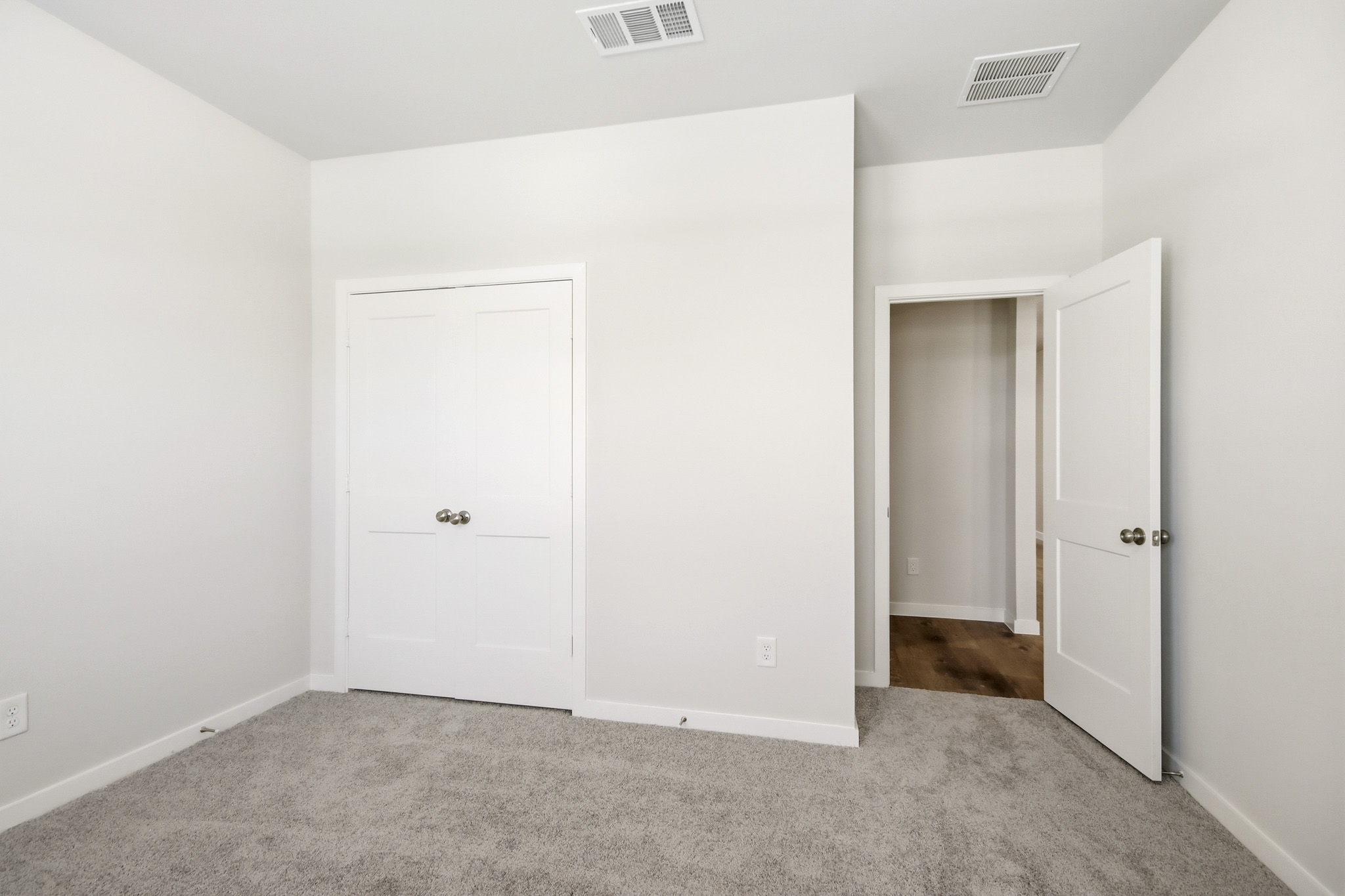 A room with white doors.