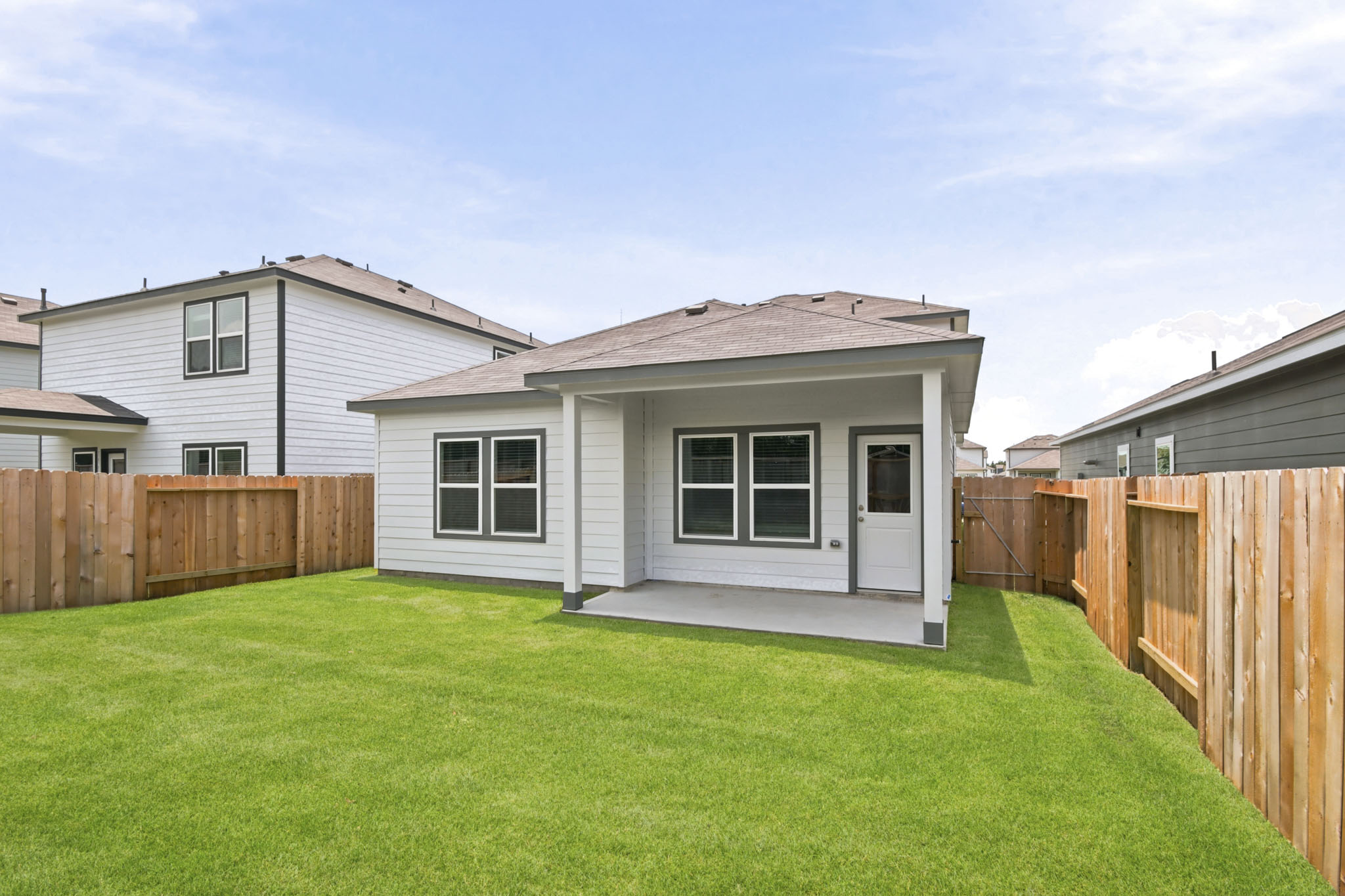 A house with a fence around it.
