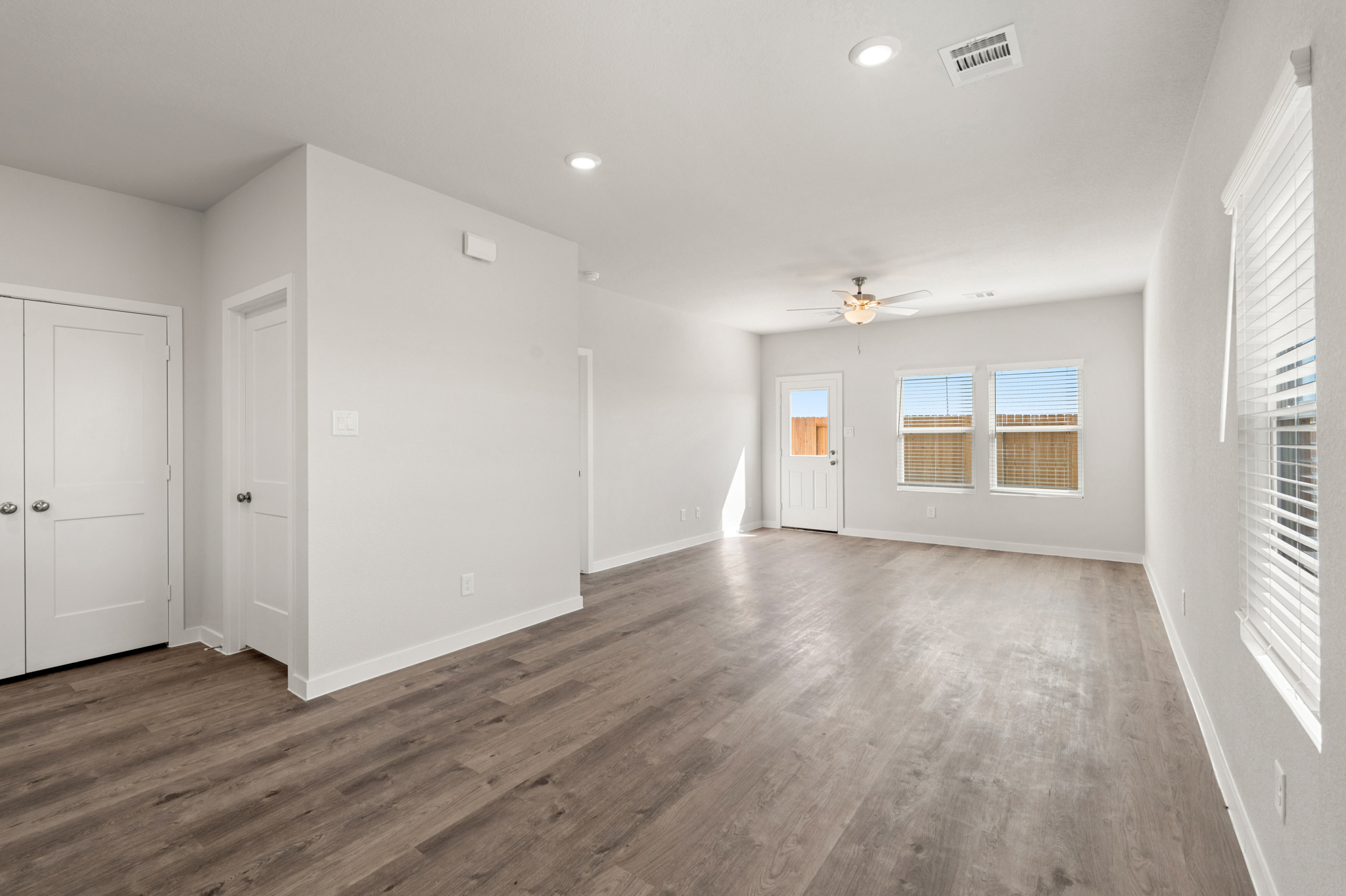 A room with white doors and windows.