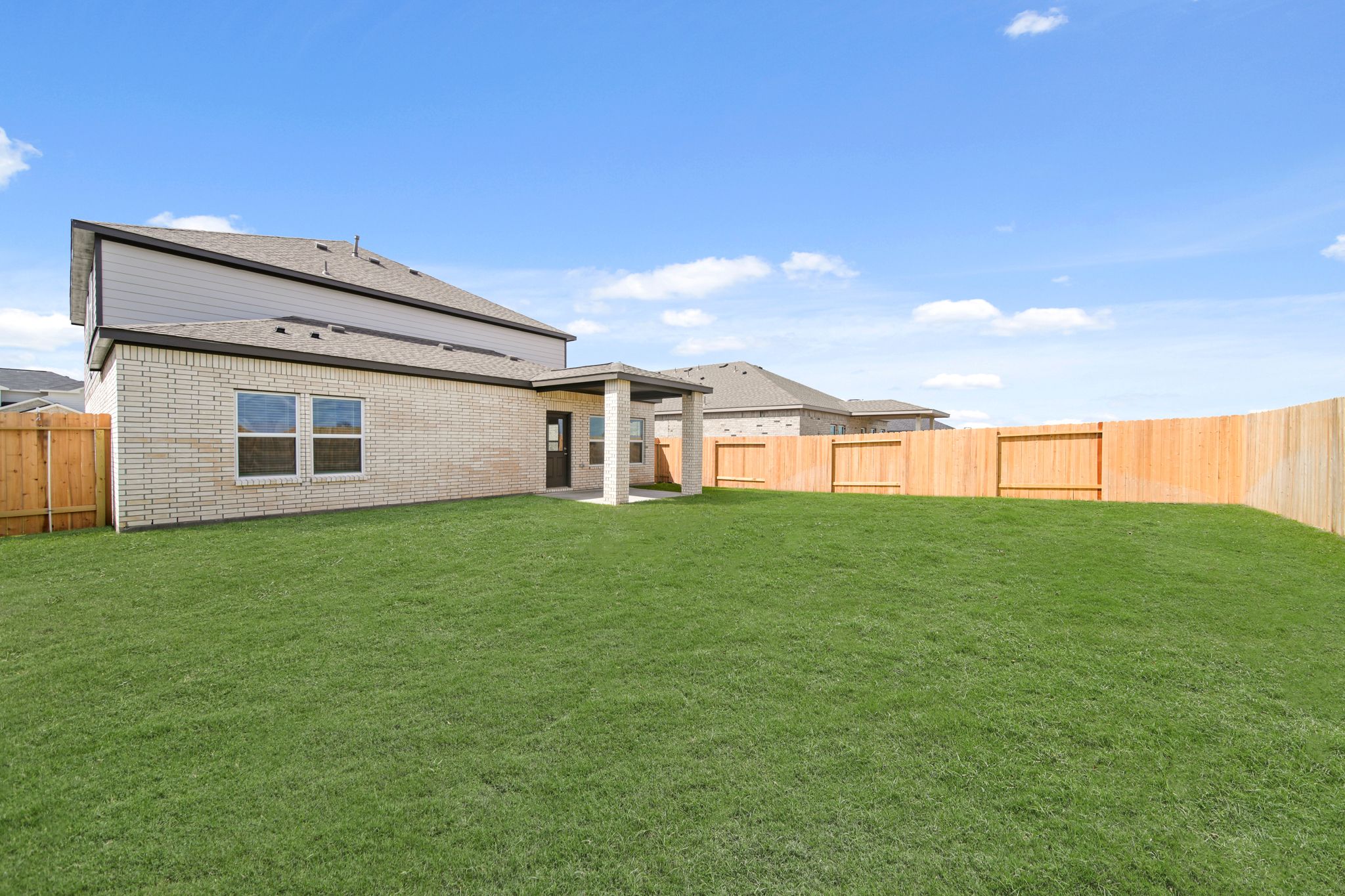 A house with a fence around it.