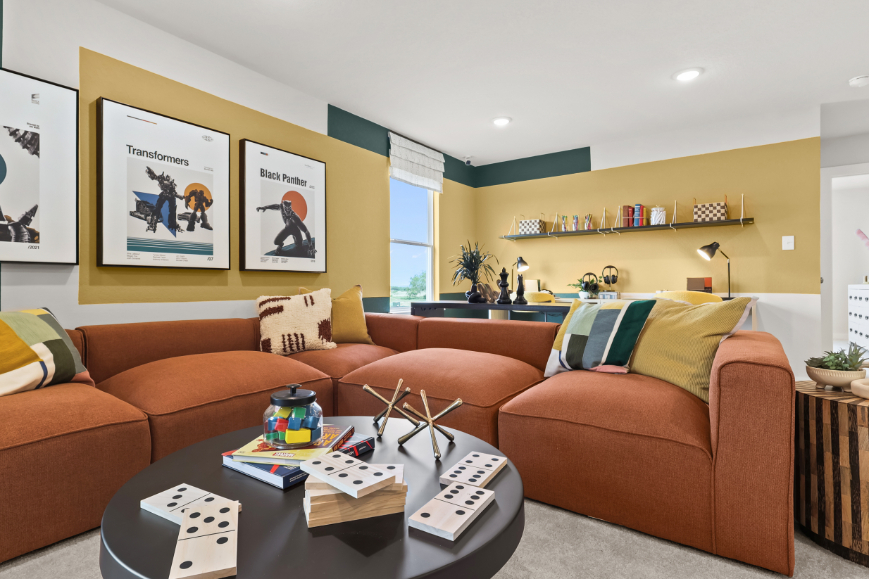 A living room with a couch and a coffee table.