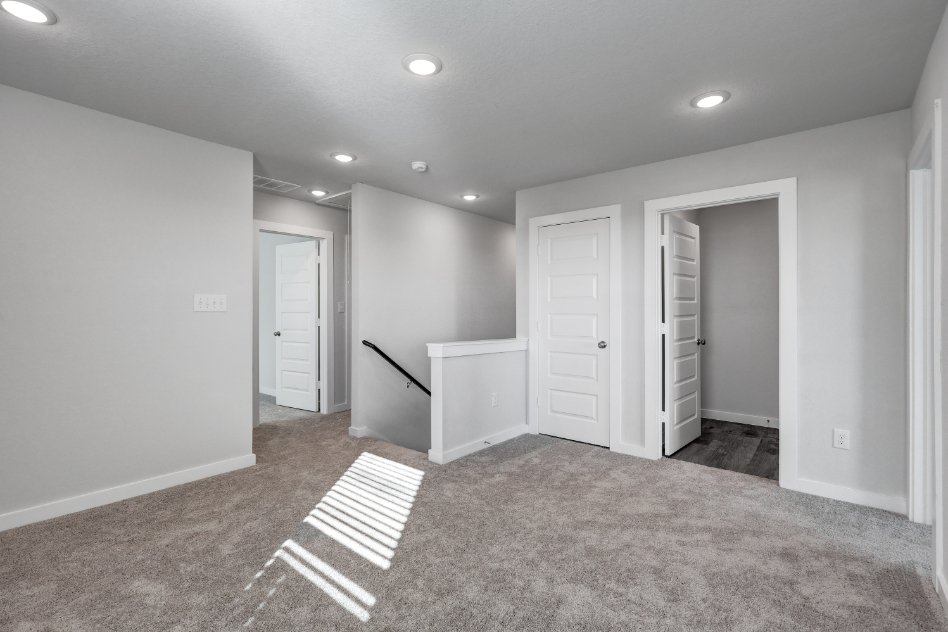 A room with white doors.