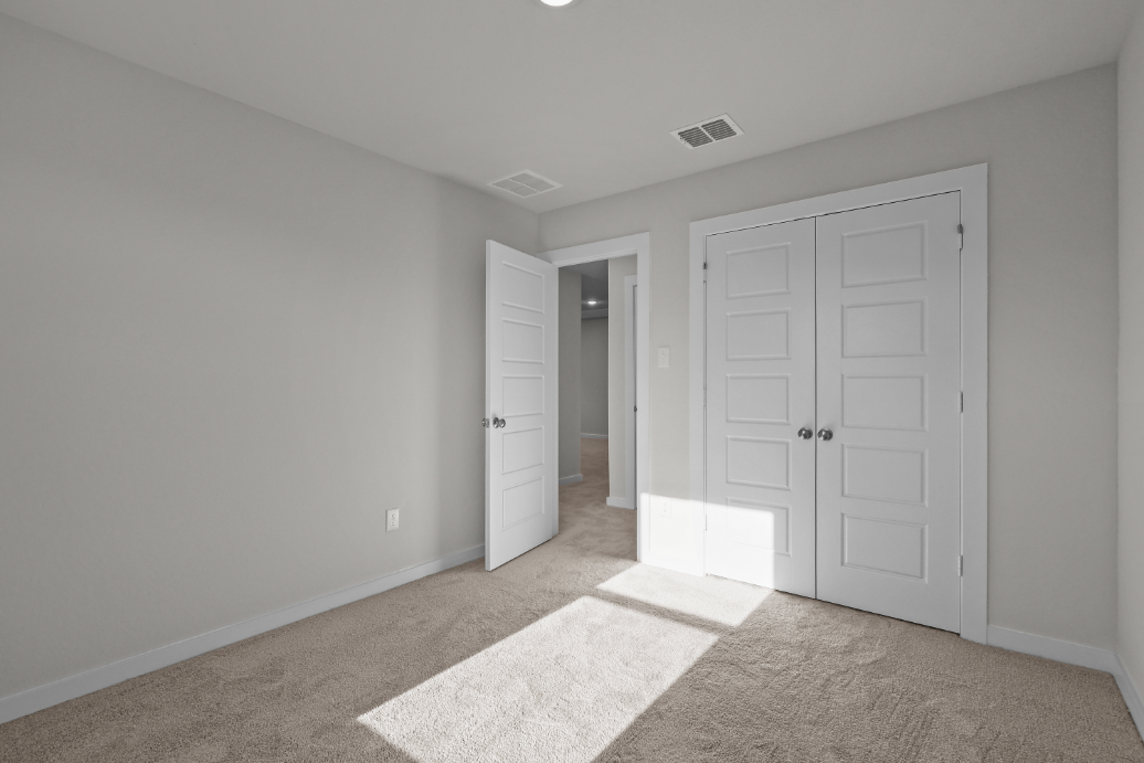 A room with white doors.