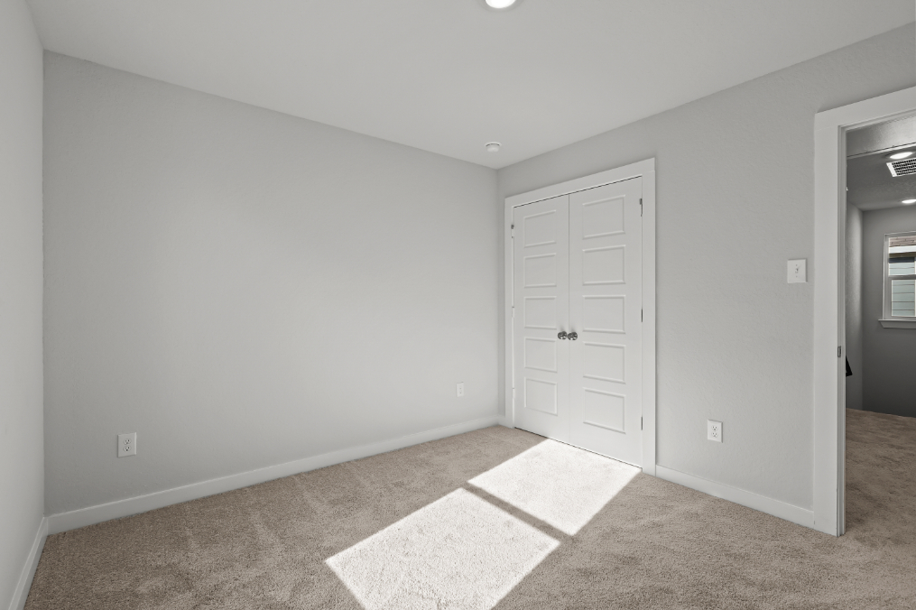 A room with white doors.