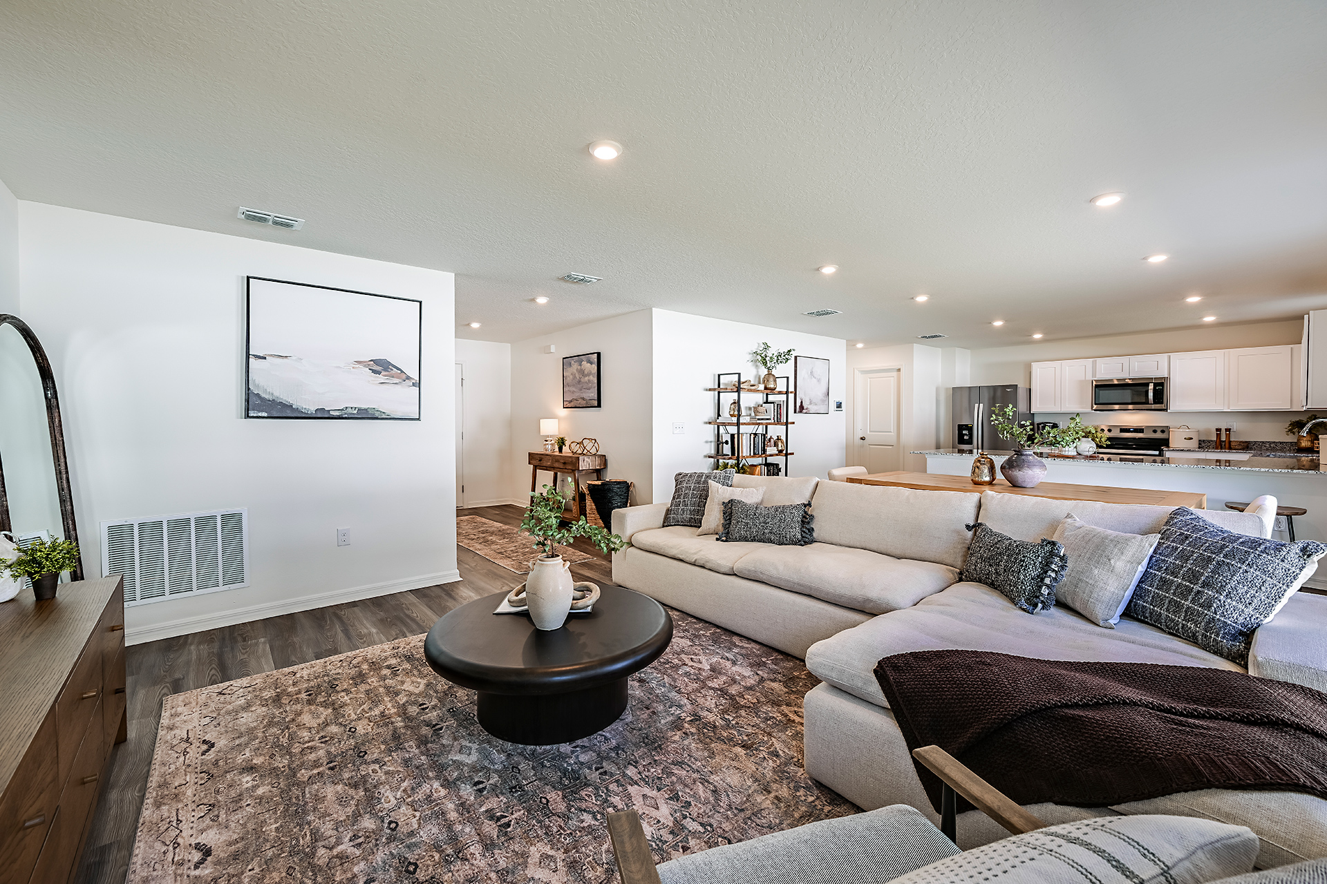A large living room with a couch and a coffee table.