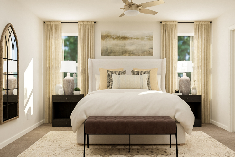 A bedroom with a bed and lamps.