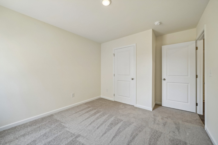 A room with white doors.