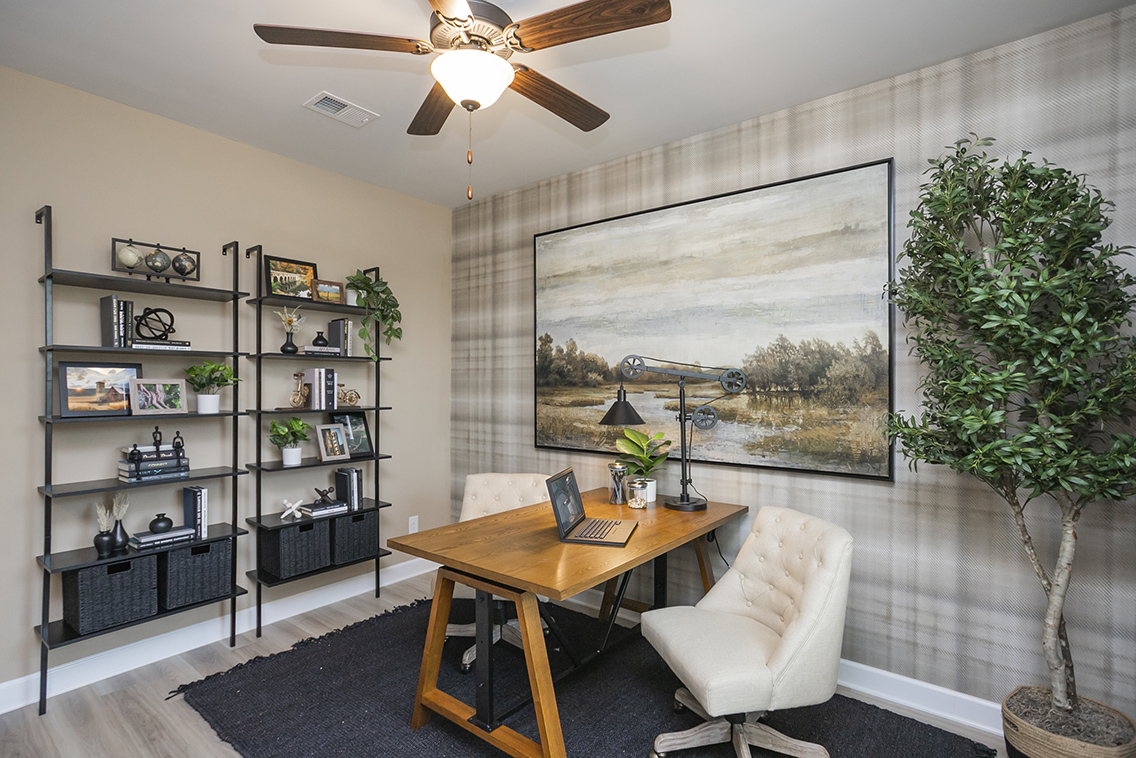 A room with a table and chairs.